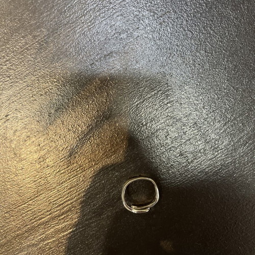 Steel ring silver color adjustable size with hands design like new
