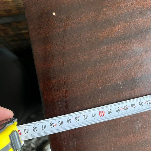 Wooden black shelf used with minor wear