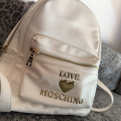 Love Moschino white backpack like new with gold details
