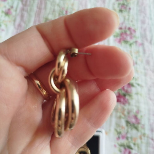 H&M gold-tone earrings like new with two connected circles design