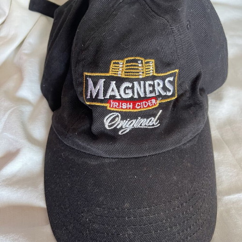 Magners cider branded hat used with small discoloration