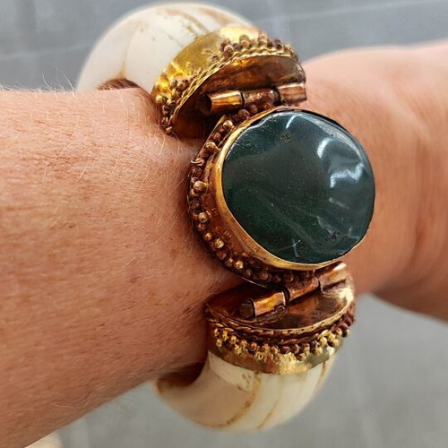 Vintage ethnic horn bracelet with green stone and bronze