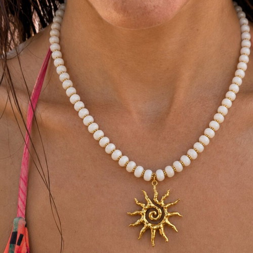 Handmade white and gold necklace with sun pendant