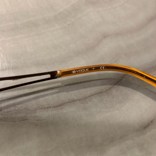 Vogue eyeglasses like new with daisy design