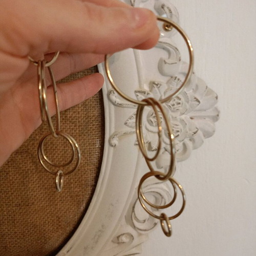 Earrings hoops braided together like new