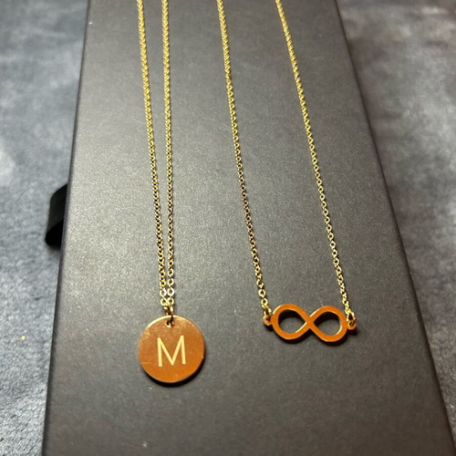 Set of 2 pendants letter M and infinity symbol gold color, new