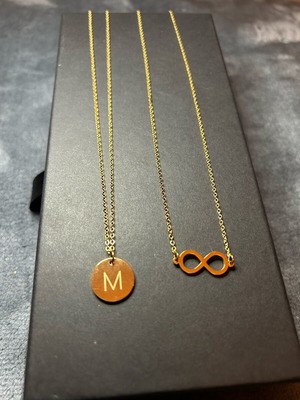 Set of 2 pendants letter M and infinity symbol gold color, new