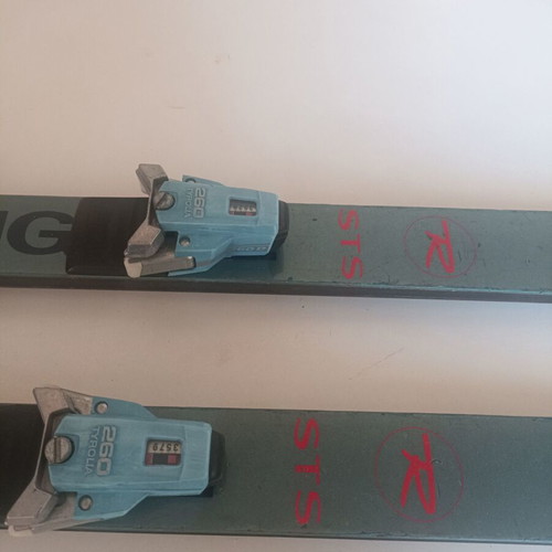 Rossignol STS Fibroplastic skis used with Tyrolia 260 bindings, Skitique poles, and Solomon SX81 325 boots
