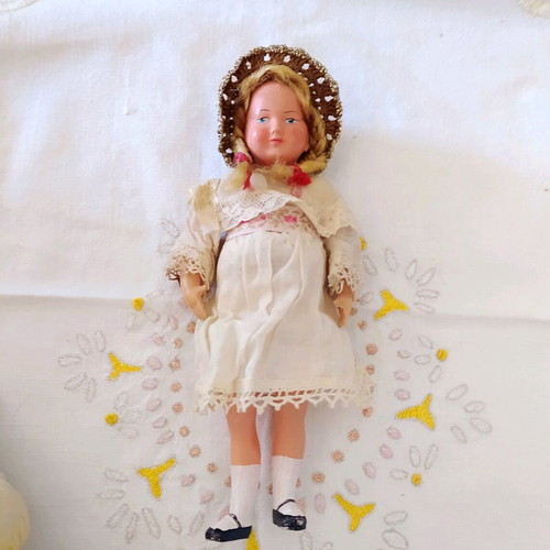 Celluloid collectible doll with stamp and numbering 175
