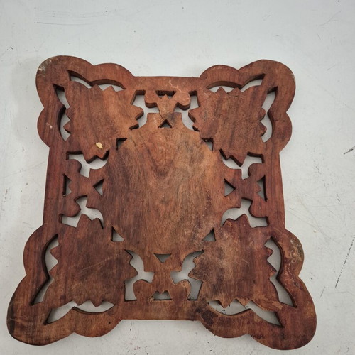 Handmade wooden carved decoration with embossed grapevine design