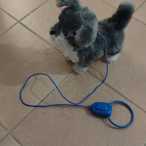 Walking and barking toy dog like new, battery operated