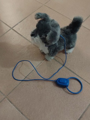 Walking and barking toy dog like new, battery operated