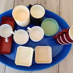 Collection of used airplane food containers, set of 31, airline brands