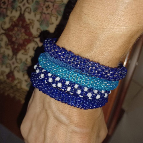 Bracelets new, set of 4 in various colors