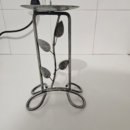 Metal candlestick with leaves like new