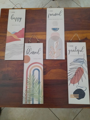 Wooden wall plaques with four positive messages, like new