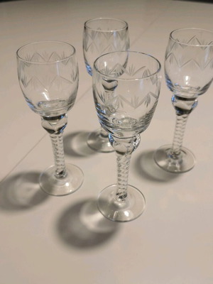 Vintage liqueur glasses with embossed designs, like new, set of 4