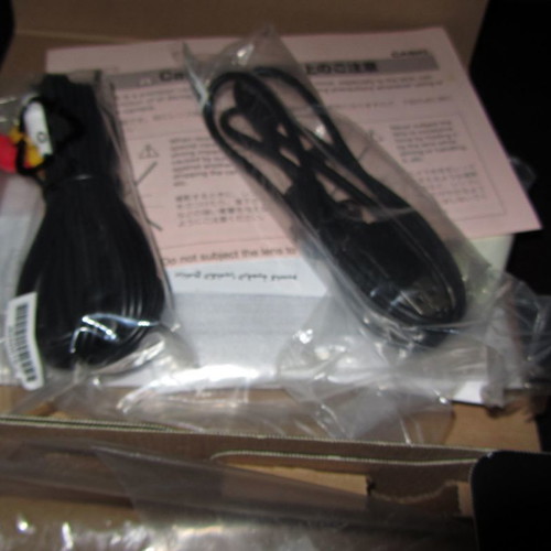 Casio Exilim EX-7 camera box used with cables without camera