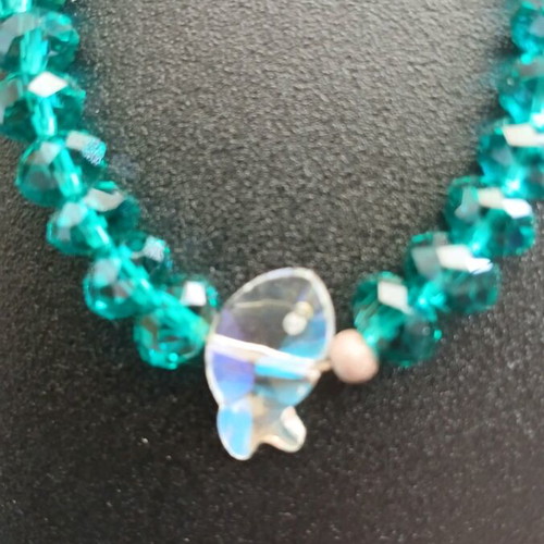 Bracelet with crystal beads used, emerald/petrol color with fish motif