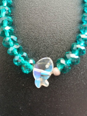 Bracelet with crystal beads used, emerald/petrol color with fish motif