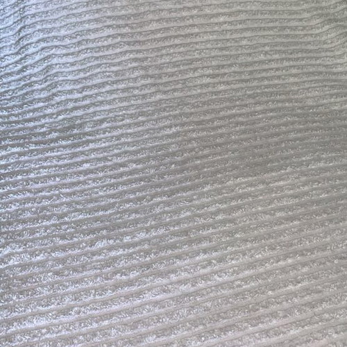 Cotton quilt for large bed, pale pink, striped with fringes