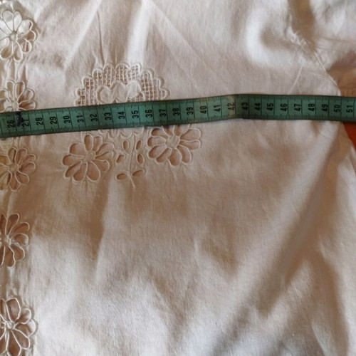 Traditional white shirt with cutwork embroidery used