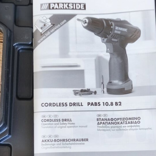 Parkside cordless drill used with charger and manual