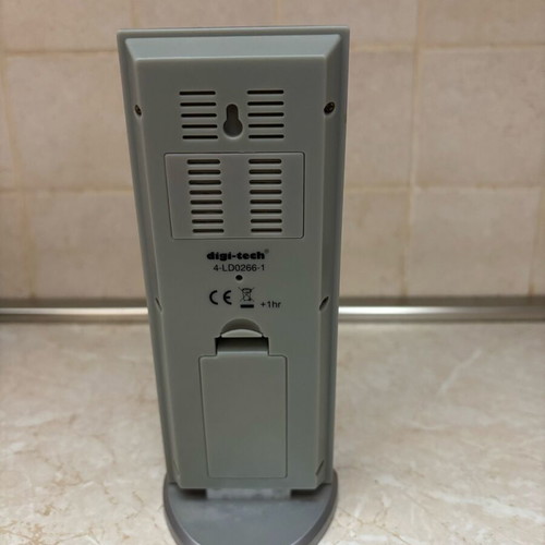 Wireless digital weather station used with radio-controlled clock