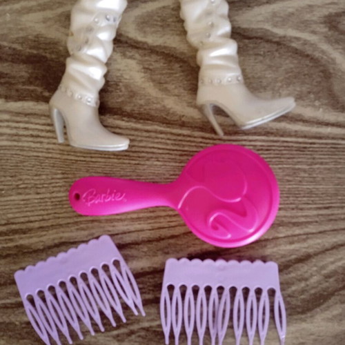 Barbie boots and combs used