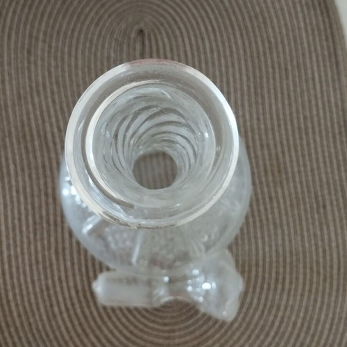 Carafe antique glass with decorative designs and original stopper, used