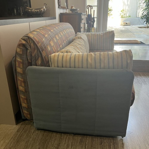 Two-Seater Sofa Bed used, practical and space-saving