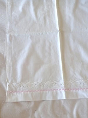 Pillowcase used, white with lace and pink embroidery 58 x 43