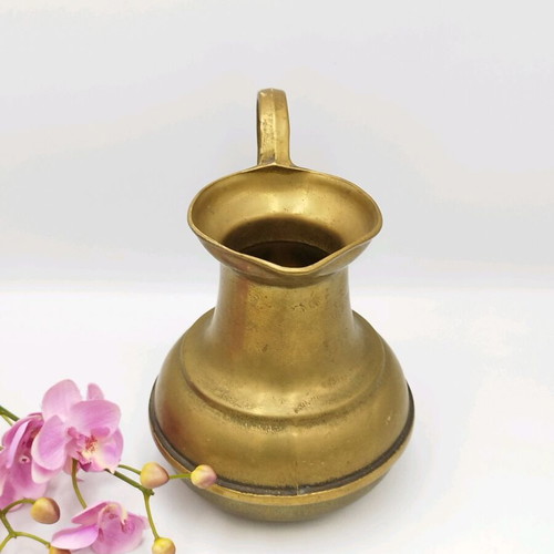 Old bronze pitcher used, vintage vase