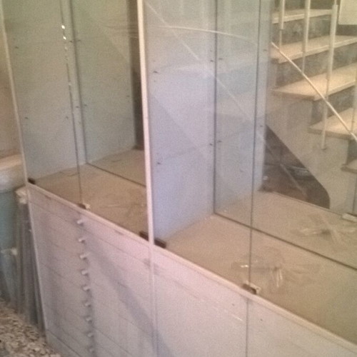 Display cabinet used with internal lighting, wood, lacquer and glass