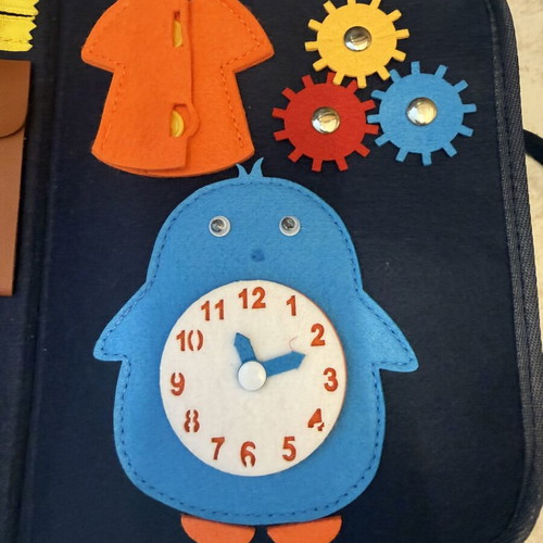 Montessori activity bag with dinosaur design, felt busy board