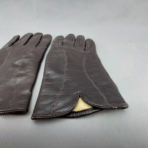 Women's dark brown leather gloves used