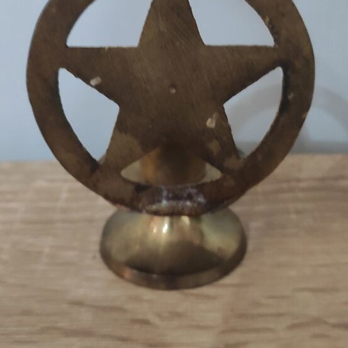Vintage brass candle holder with star