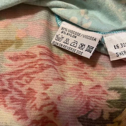 Women's blouse in medium, multicolored with turquoise as the main color