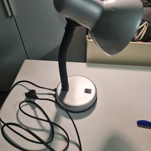 Desk lamp used with flexible arm and switch silver color