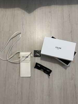Celine sunglasses used with minor scratches, black