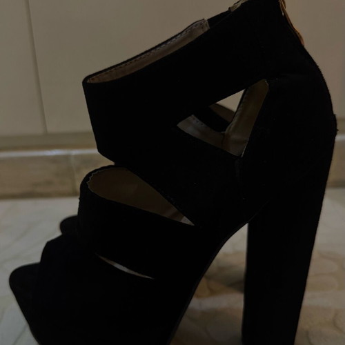 Black platforms size 36 mint condition with gold zipper