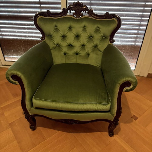 Vintage classic armchair with solid wood and green velvet upholstery