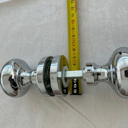 Door knobs used, 9 sets, chrome ball type with rosette