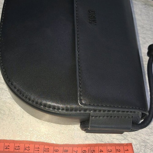 Dkny black leather crossbody bag like new with knot design strap