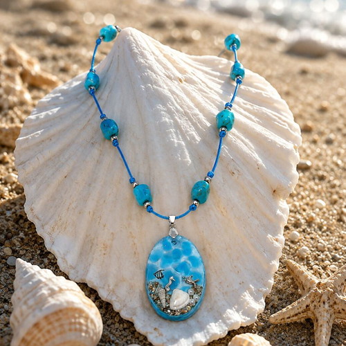 Handmade necklace with turquoise semiprecious stones and glass pendant