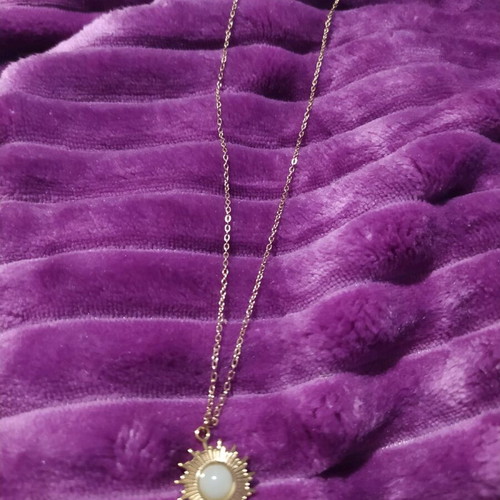 Steel pendant new, gold color with white stone