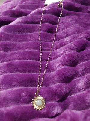 Steel pendant new, gold color with white stone