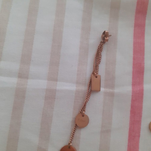 Triple hanging earrings made of steel in gold color like new