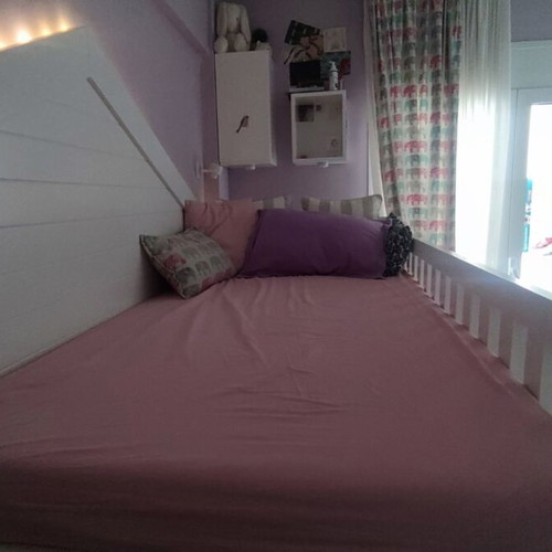 Bed with storage space, lacquered wood