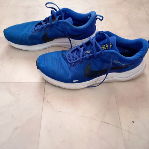 Nike athletic shoes pair, blue, size 46